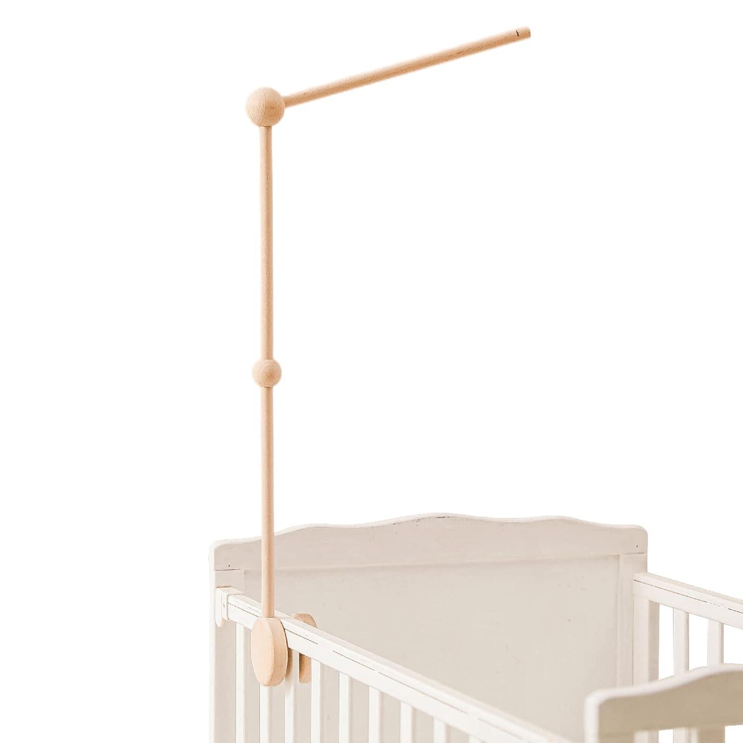 Crib mobile showdown: HBM's wooden elegance vs. classic charm